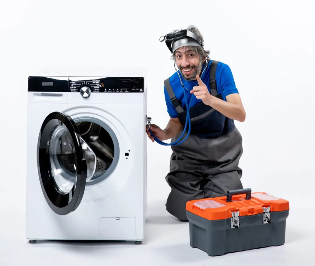front view happy repairman putting stethoscope washer sitting near washer white space scaled e1737707482354 1024x863.jpg copy (2)